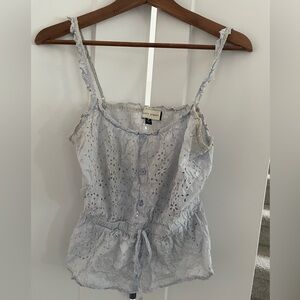 Embroidered seersucker like garment. Perfect for the warmer temperatures.